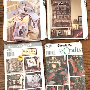 May include: Four vintage craft pattern packets. Two are McCall's Crafts, one is Butterick, and one is Simplicity Crafts. The McCall's packets feature American Tradition designs. The Butterick packet has Waverly patterns. The Simplicity packet has Donna Lang designs.