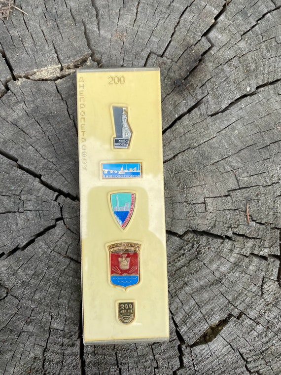 Set of metal badges of the Soviet era Dneprpetrovs