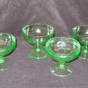 Set of 4 uranium glass pedestal dessert bowls, antique glowing green glass ice cream bowls, thumb print pattern, fruit bowls, mid century