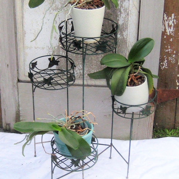 Vintage metal plant stand, collapsing green metal four tiered 1970s, outdoor indoor porch patio plant storage decorative multiple plants