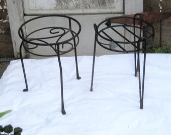 Vintage short metal plant stands, hair pin curved legs, heavy black wrought cast iron, mid century 50s 60s, outdoor indoor single pot stand