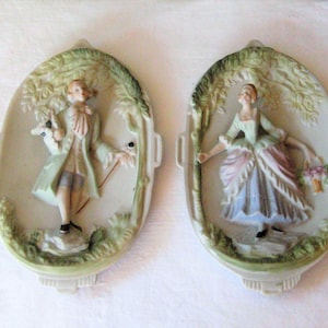 Porcelain wall hanging Victorian couple figural antique ceramic plaques Man Woman green gray Chase made in Occupied Japan 1940s hand painted