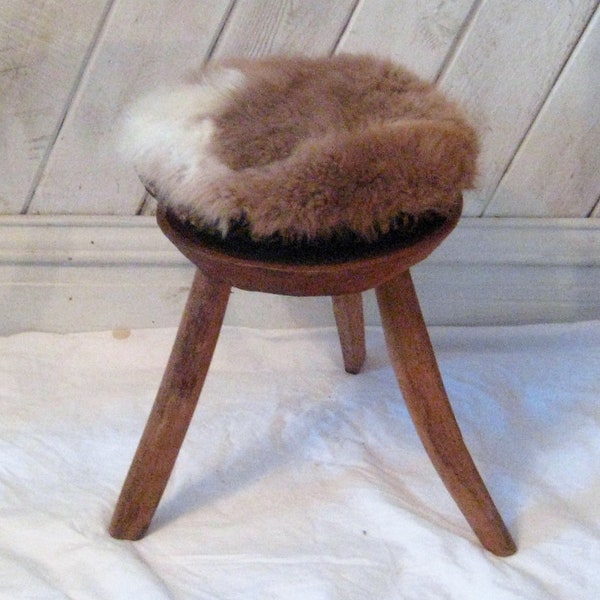 Antique hand hewn wood stool, three leg sitting stool, genuine fur padded seat upholstered stool, rustic cabin farmhouse decor one of a kind