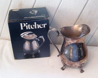 Ornate silver plated pitcher with ice guard in original box, two quart metal teapot, decorative feet, coffee pot, vase, 70s, made in USA