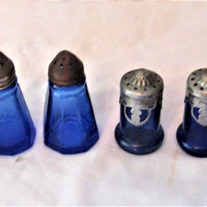 Antique cobalt blue glass salt and pepper shakers, silver metal lids, mid century, small, collectible S & P, ornate rustic, Hazel Atlas