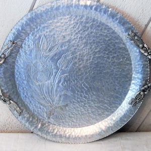 Ornate round metal aluminum tray, decorative handles, hand hammered wrought, floral design, silver drink tray, Rodney Kent, mid century