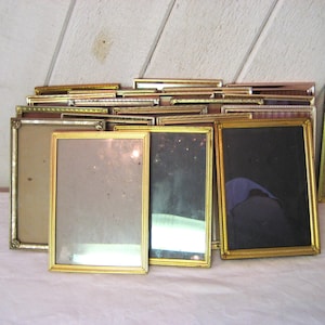 Vintage brass picture frame, 5 x 7 inches, thin gold metal frame, mid century 50s 60s, school pics portrait frames, table top wall