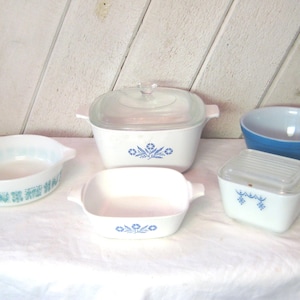 Vintage Pyrex blue nesting bowl casserole dishes, pair white corning ware, made in USA, mid century 50s 60s, clear glass lids