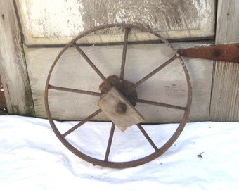 Antique cast iron wheel, heavy metal tractor wagon wheel, outdoor garden porch decor, 1800s early 1900s, rustic primitive farmhouse decor