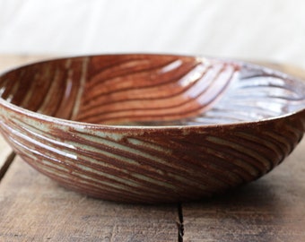 Carved bowel in earth tone shades, stoneware clay, handmade.