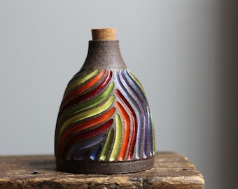 Rainbow vessel with cork top