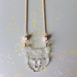 Polar Fox, winter necklace. Beads cut plexiglass laser engraved, wood and bead chain. The magic of snow flakes
