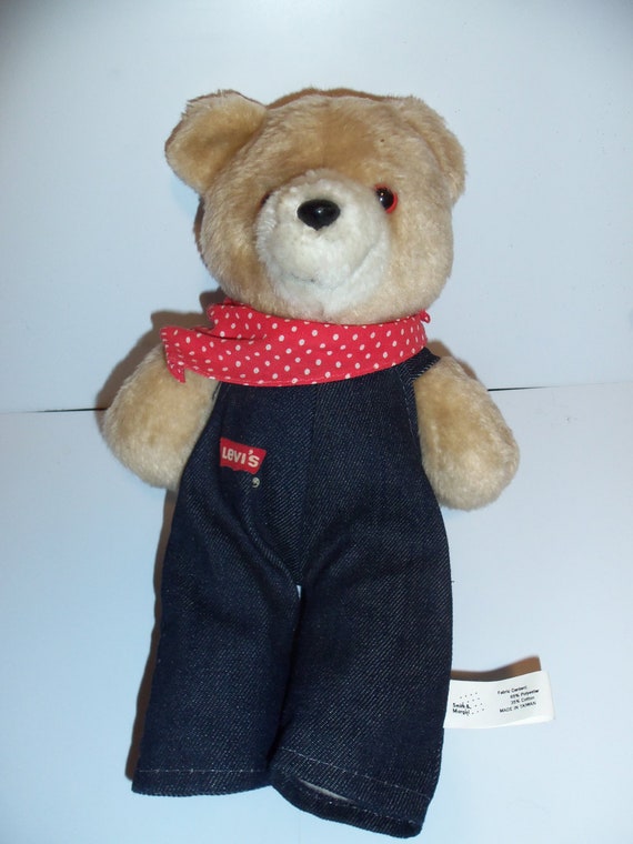 teddy bear with overalls