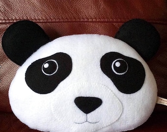May include: A white plush panda head with black ears, eyes, nose, and markings. The panda has a stitched smile.