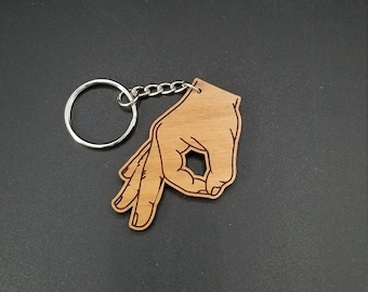 Circle game hand wood keychain