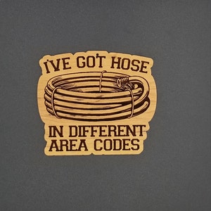 I&#39;ve got hose in different area codes cherry hardwood santa ornament