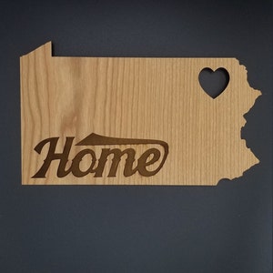 State cut out wooden sign