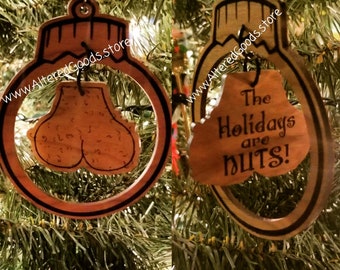 Die Feiertage sind Nüsse baumelnden Kugeln Ornament