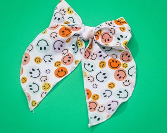 Laço de cabelo com carinha sorridente: laço de algodão Groovy Girl, faixa de cabeça de nylon ou presilha