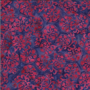 May include: A blue and pink fabric with a repeating pattern of stylised flowers and swirls.