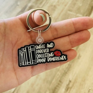 Single and forever collecting book boyfriends keychain