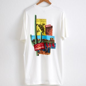 VTG Deadstock 1990s Marlboro Wild West Pocket T Shirt Sz. XL Extra Large White Tee Cigarettes Rodeo Cowboy Snake Pass ASAP Rocky
