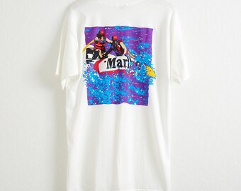 ASAP Rocky Smokes in a Vintage Marlboro T Shirt and Vans ASAP Rocky Smokes in a Vintage Marlboro T Shirt and Vans