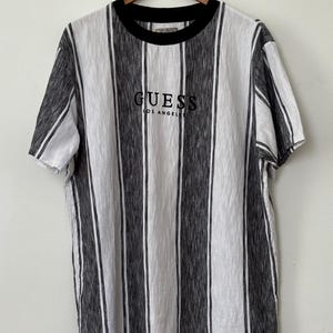 VTG 1990s Guess Originals Striped T Shirt Sz. L Large Worldwide Los Angeles International Black White Tee by Georges Marciano Stripes Jeans