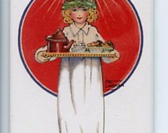 May include: Rectangular magnet featuring a vintage illustration of a girl in a white dress carrying a tray with food and a teapot. She wears a crown of candles and a green wreath. A red circle and blue border frame the image.
