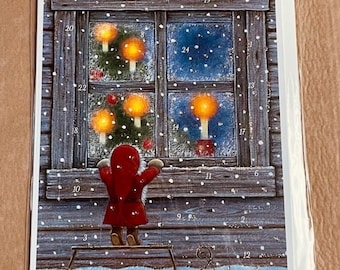 May include: A rectangular advent calendar card featuring a gnome in a red coat standing on a wooden sled, looking into a window with glowing candles. The scene is set against a dark wooden wall with snow falling and numbered doors from 1 to 24.