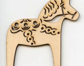 May include: A wooden Dala horse figurine with intricate cut-out designs. The horse is light brown and features decorative patterns on its body and mane. It stands on four legs and has a detailed head with a bridle.
