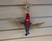 Scandinavian Nordic Santa Elf Gnome on Straw Moon Beneath Straw Star