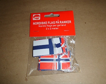 May include: A package of Nordic flag garlands. The flags are red, white, and blue, and are strung on white string. The package is red with white text that reads "Nordic flags per garland 2 x 2 meter."