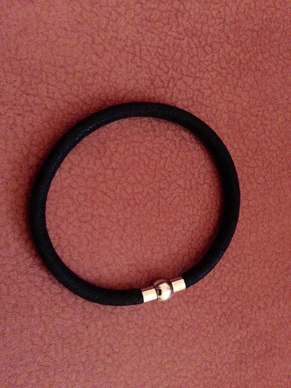 Black fabric bracelet with a magnetic lock, fashion, modern style, for do ist yourself bracelets