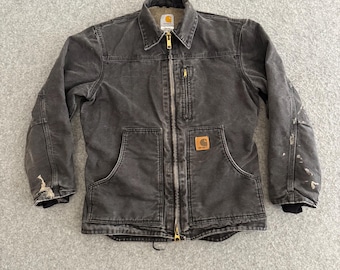 Chaqueta Carhartt C61 negra de lona con forro de sherpa y efecto desgastado, talla grande.