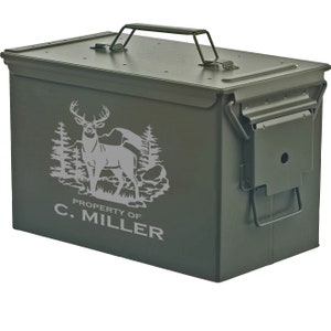 May include: Green metal ammo can with a deer silhouette and the text "PROPERTY OF C. MILLER" printed on the front.