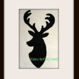May include: A black silhouette of a deer head with large antlers centred on a textured off-white fabric background. The green text "Nains knitting world" is printed in a small, simple font near the bottom of the deer's neck area.