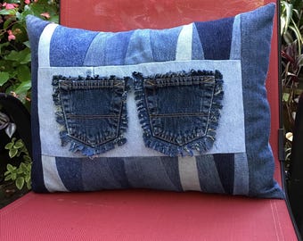 Denim toss pillow made from recycled jeans.