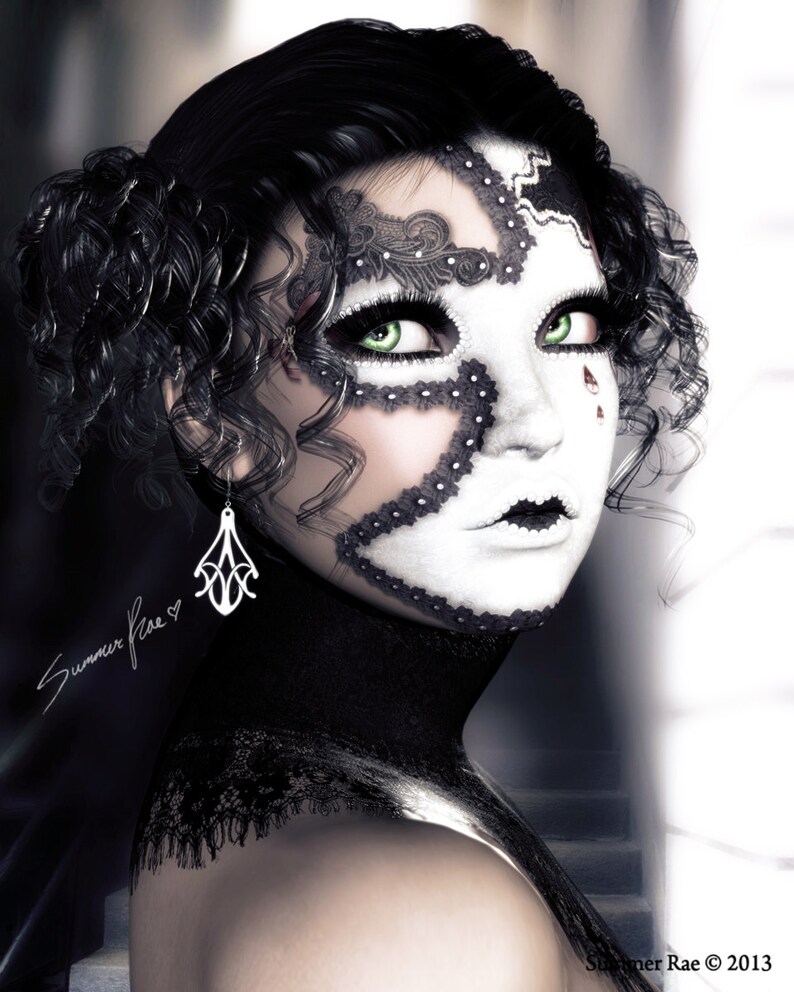 May include: A woman with dark curly hair wears a white mask with black lace detailing. The mask covers her eyes and part of her face. She is wearing a black lace collar and earrings.