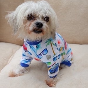 Cute little dog wearing pajamas, little dog clothes, pet clothes for small dogs, dog pajamas, dog suit all in one for dogs