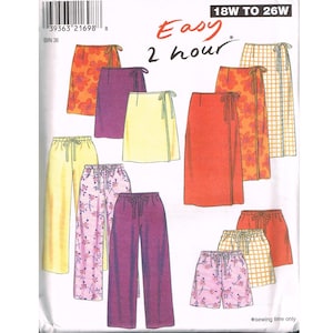 May include: A New Look sewing pattern envelope 6766 for sizes 18W to 26W. The front displays illustrations of various skirts, pants, and shorts with drawstring waistbands in solid colors, floral prints, and plaid patterns, labeled Easy 2 hour.