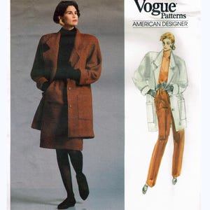 May include: Vogue Patterns sewing pattern by Tamotsu, featuring a long coat and skirt ensemble, and a coat and trousers outfit. The pattern includes the text "AMERICAN DESIGNER" and "EASY/FACILE". The pattern number is 1953.