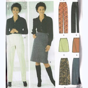 May include: Simplicity sewing pattern 5844 for skirts and trousers. The pattern features illustrations of different skirt and trouser styles. The pattern size is R5, fitting sizes 14-22.