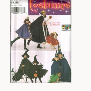May include: Simplicity Costumes sewing pattern number 5392 for a king, witch, and wizard costumes. The pattern includes instructions for making costumes for children and a dog.
