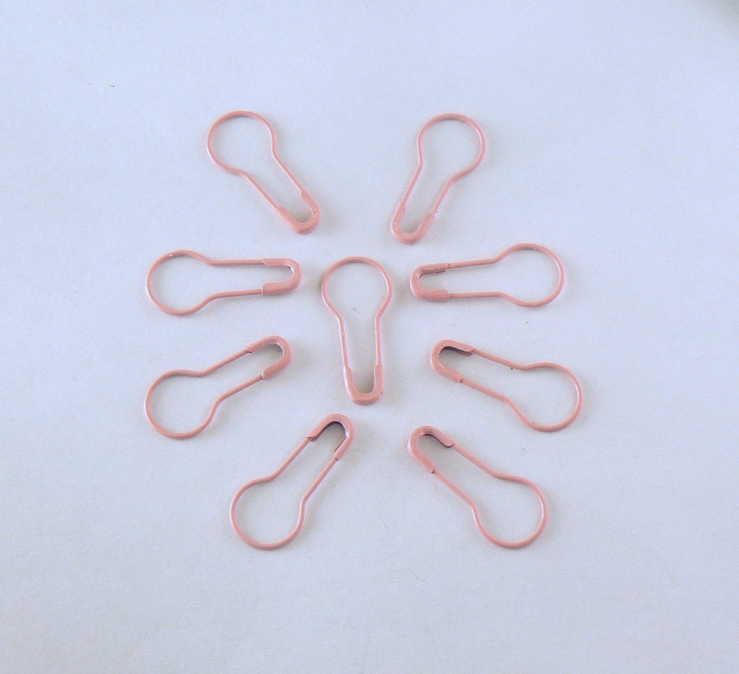 25 marcadores de punto de imperdible en forma de bombilla de color rosa  claro para tejer o ganchillo. -  España