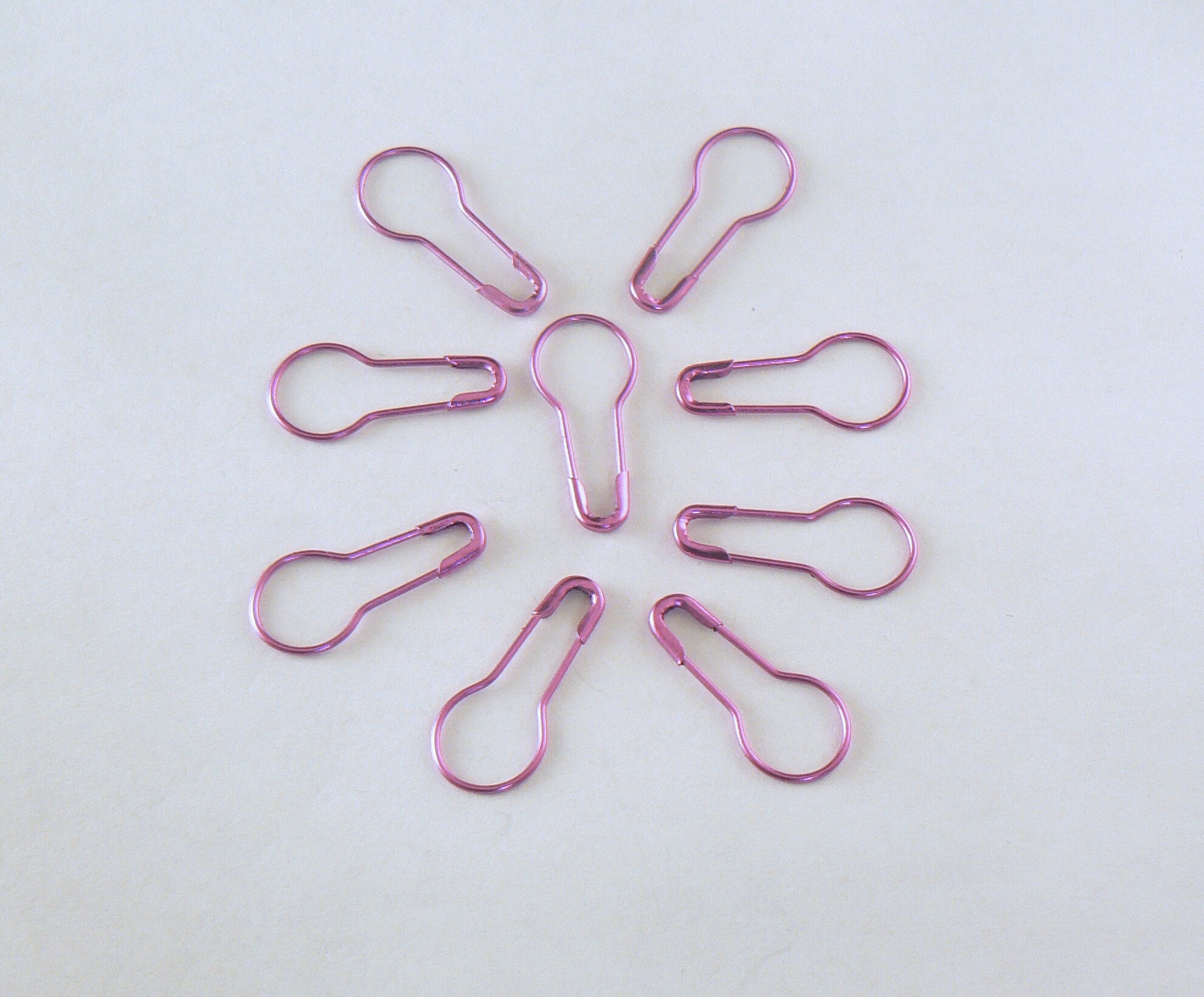 25 marcadores de punto de imperdible en forma de bombilla de color rosa  metálico para tejer o ganchillo. -  México