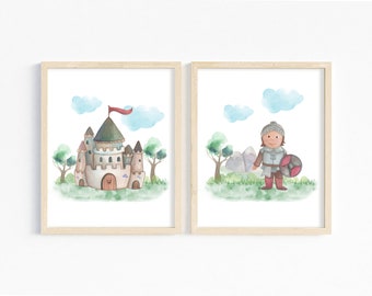 May include: Two framed watercolor prints. One depicts a castle with a red flag, the other a knight with a shield. Both have a light green grassy area, trees, and blue clouds. The frames are light wood.