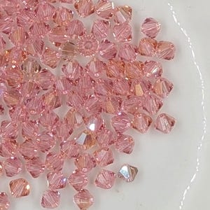 Swarovski 4mm Bicone 5328 (20 crystals per pkg) in Light Rose Champagne, AB Jonquil, AB Silk, Rose Water Opal AB & more
