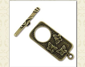 Brass toggle clasps and hook & eye clasps, available in 4 styles. Butterfly toggle, leaf toggle, hook and eye, and a leaf hook and eye.