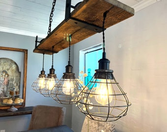 Barn wood 4 hanging light Chandelier with Barnwood Beam, Iron Brackets  and steel cage pendants. FREE SHIPPING Edison bulbs rustic